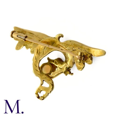 119 - An Art Nouveau French Opal-Set Chimera Brooch

The French 18ct yellow gold chimera brooch is set wit... 