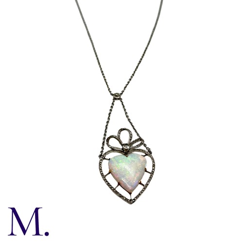 120 - An Antique Opal Heart and Diamond Necklace

The fine 18ct white gold necklace suspends a fine heart-... 