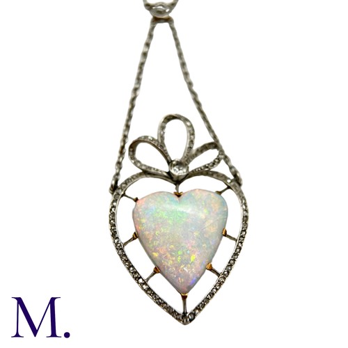 120 - An Antique Opal Heart and Diamond Necklace

The fine 18ct white gold necklace suspends a fine heart-... 