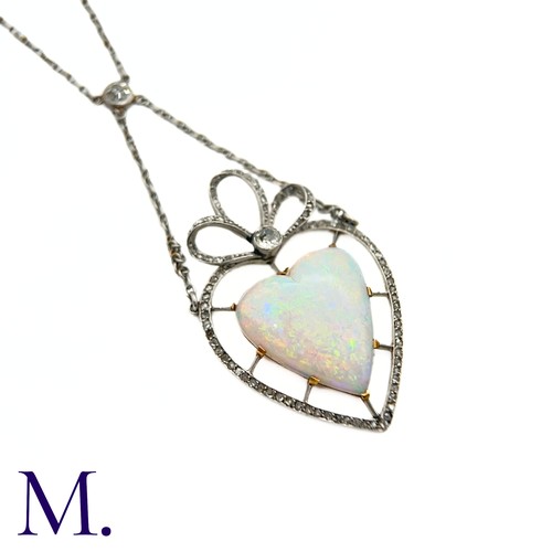 120 - An Antique Opal Heart and Diamond Necklace

The fine 18ct white gold necklace suspends a fine heart-... 