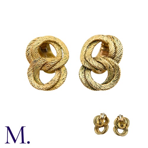 110 - A Pair of Gold Earclips by Georges Lenfant

The 18ct yellow gold woven earclips are by French goldsm... 