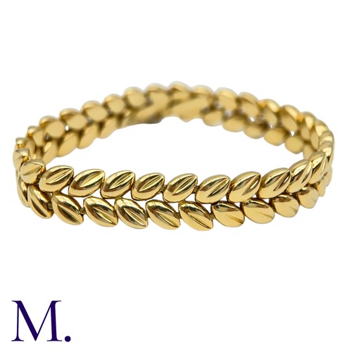 109 - A Gold Bracelet by Boucheron

The 18ct yellow gold bracelet with foliate form is by Boucheron Paris ... 