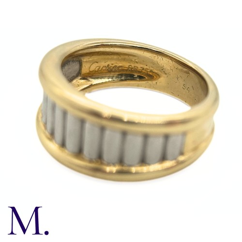 96 - A Two-Colour Gold Ring by Cartier

The two-colour fluted gold ring is by Cartier Paris.  The band is... 