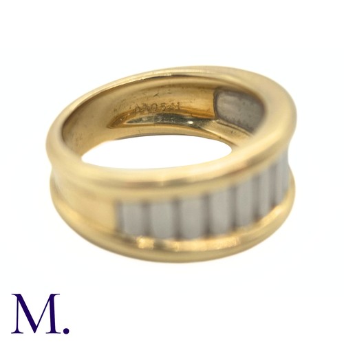 96 - A Two-Colour Gold Ring by Cartier

The two-colour fluted gold ring is by Cartier Paris.  The band is... 