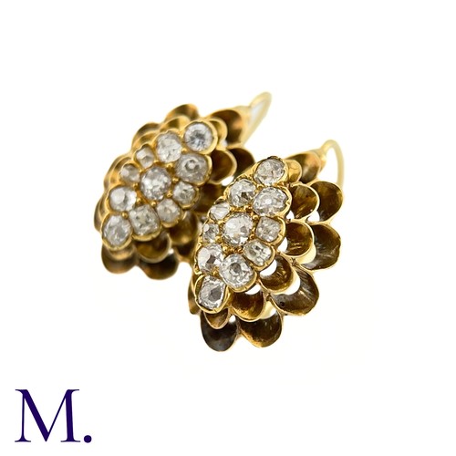 61 - A Pair of Antique Diamond Earrings

The 18ct yellow gold earrings are set with old cut diamonds amou... 