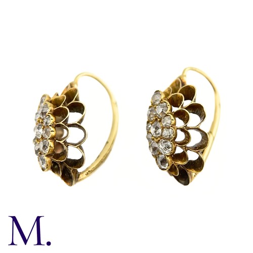 61 - A Pair of Antique Diamond Earrings

The 18ct yellow gold earrings are set with old cut diamonds amou... 