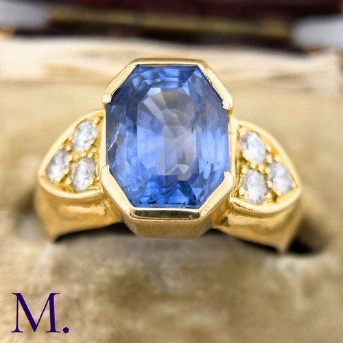 133 - A Sapphire and Diamond Ring

The weighty 18ct yellow gold ring is set with a good size bright blue o... 