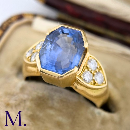 133 - A Sapphire and Diamond Ring

The weighty 18ct yellow gold ring is set with a good size bright blue o... 