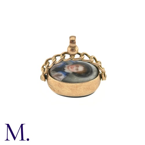 42 - An Antique Miniature and Bloodstone Spinning Fob

The 9ct rose gold spinning fob is set with an oval... 