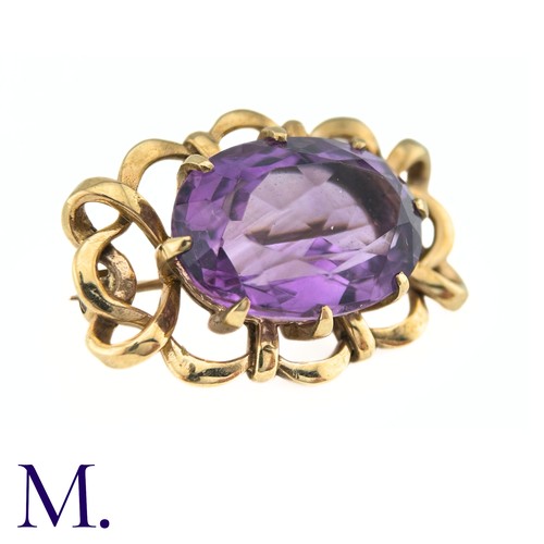 89 - An Amethyst Brooch

The 9ct yellow gold brooch is set with a large (approx. 11.4ct) well-saturated a... 