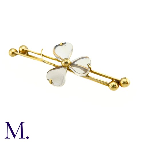 70 - An Antique Moonstone Shamrock Brooch

The 9ct yellow gold bar brooch is set with moonstones in a tre... 