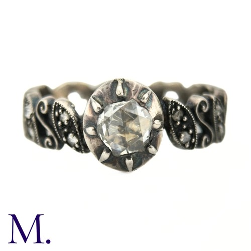 49 - An Antique Rose Diamond Ring

The antique ring is set with a round rose cut diamond (approx. 5x5mm) ... 