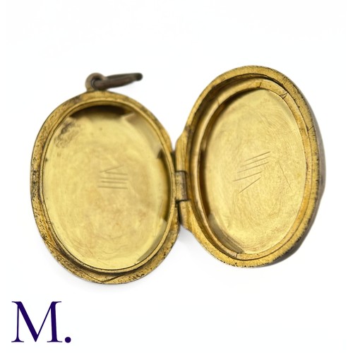 20 - NO RESERVE - A 9ct Front and Back Locket

The 9ct gold front and back are engraved. Inside are two c... 