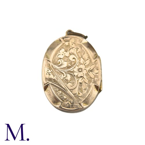 20 - NO RESERVE - A 9ct Front and Back Locket

The 9ct gold front and back are engraved. Inside are two c... 