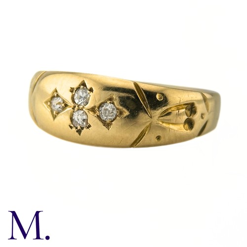 32 - An Antique Diamond Gypsy Ring

The antique 18ct yellow gold ring is set with four small diamonds.

W... 