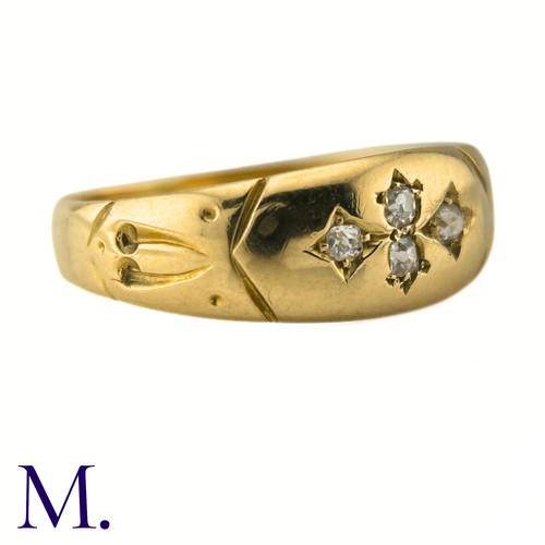 32 - An Antique Diamond Gypsy Ring

The antique 18ct yellow gold ring is set with four small diamonds.

W... 