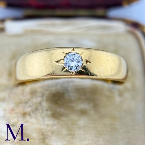 40 - A Diamond Gypsy Ring

The 18ct yellow gold band is set with a 0.15ct round cut diamond.

Weight: 6.4... 