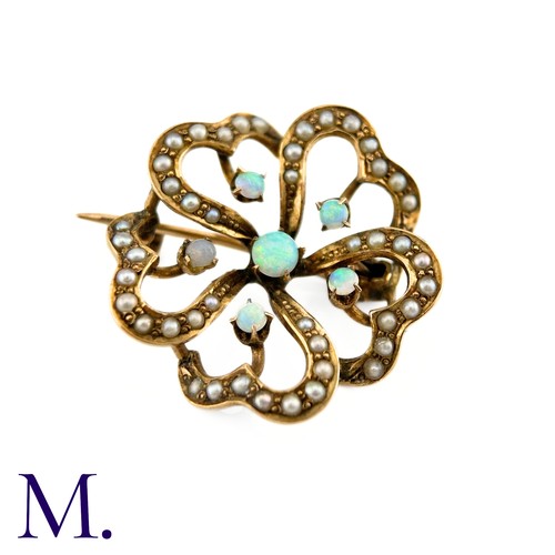 117 - An Opal and Pearl Brooch

The floral patterned openwork brooch in 9ct yellow gold is set with good c... 