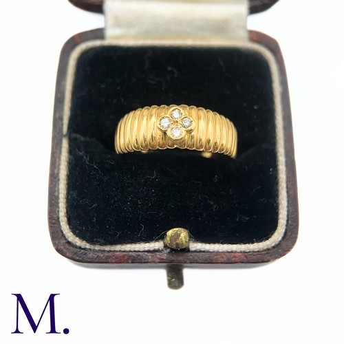 162 - A French Diamond Fleurette Ring

The 18ct yellow gold ring is set with four small round cut diamonds... 