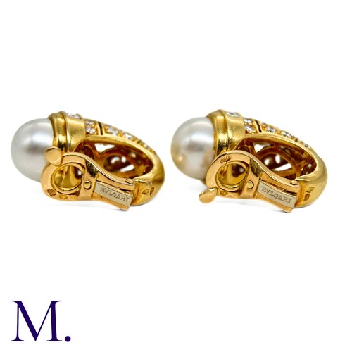 111 - A Pair of Pearl and Diamond Earclips by Bulgari

The 18ct yellow gold earclips are by Bulgari.  Each... 