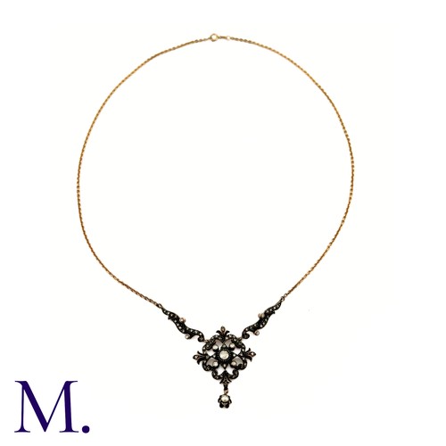 11 - A Rose Diamond Necklace
The rose diamond pendant hangs from a 48cm later 14ct gold chain.  The large... 