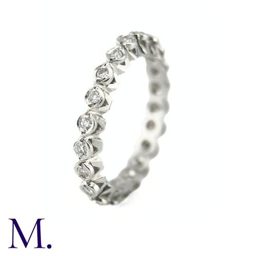 15 - A Diamond Eternity Band

The 18ct white gold band is set with approximately 0.65ct of round cut diam... 