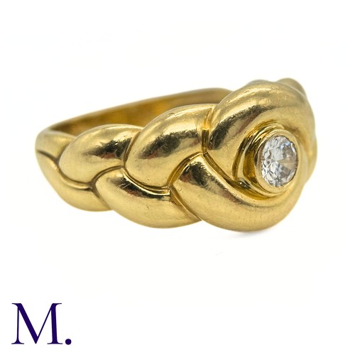 42 - A Diamond Ring by Van Cleef & Arpels

The 18ct yellow gold knot-form ring by Van Cleef and Arpels is... 