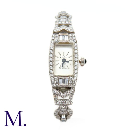 58 - A Vintage Diamond Cocktail Watch

The 18ct white gold cocktail watch is set with approximately 3.0ct... 