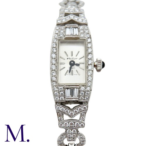 58 - A Vintage Diamond Cocktail Watch

The 18ct white gold cocktail watch is set with approximately 3.0ct... 