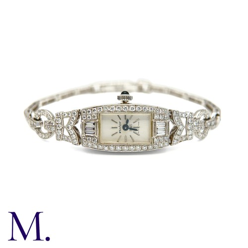 58 - A Vintage Diamond Cocktail Watch

The 18ct white gold cocktail watch is set with approximately 3.0ct... 