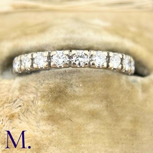 59 - A Diamond Eternity Band

The 18ct white gold band is set with approximately 1.0ct of round cut diamo... 