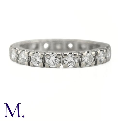 59 - A Diamond Eternity Band

The 18ct white gold band is set with approximately 1.0ct of round cut diamo... 