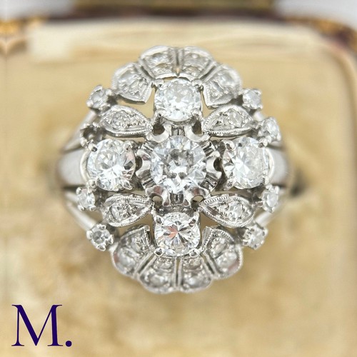 61 - A Diamond Oval Cluster Ring

The 18ct white gold ring is set with a cluster of diamonds, the centre ... 