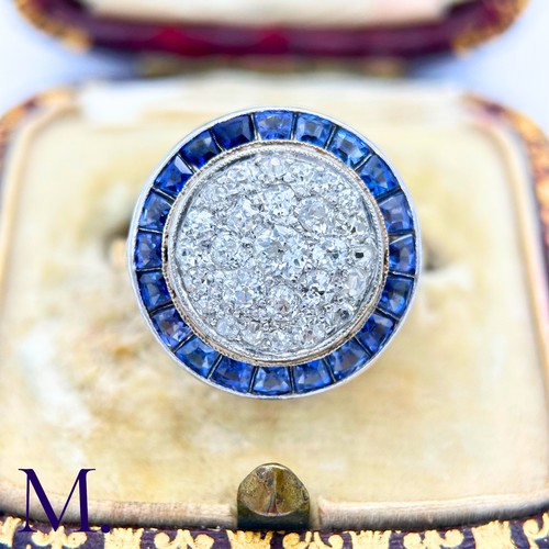 64 - A Sapphire and Diamond Target Ring

The 18ct yellow gold ring is set with a round fascia of bright w... 