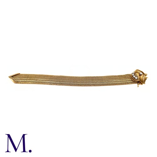 66 - A French Gold and Diamond Buckle Bracelet

The 18ct yellow gold woven bracelet terminates in a diamo... 