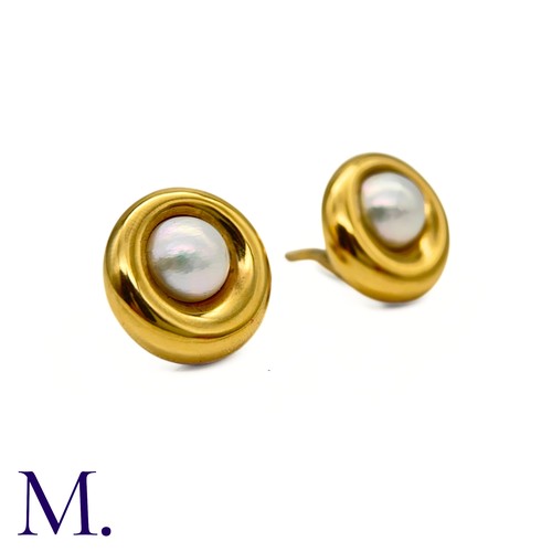 69 - A Pair of Pearl Earclips by Chaumet

The 18ct yellow gold earclips are by Chaumet Paris.  Each is se... 