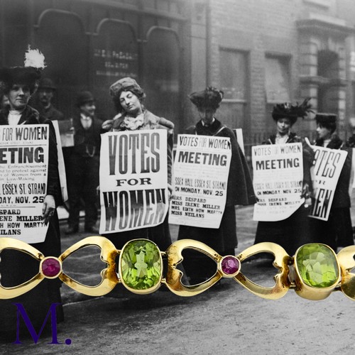 73 - A Suffragette Bracelet

The 15ct gold bracelet is set with peridot and garnet in the suffragette col... 