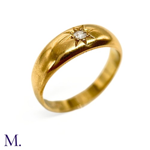 11 - An Antique Diamond Gypsy Ring

The gold band is set with a 5pt diamond and is marked '18ct'.

Box no... 