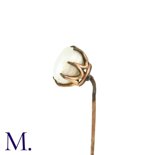 85 - An Antique Pearl Stick Pin, in yellow metal, the terminal set with a pearl of approximately 9mm. 

S... 