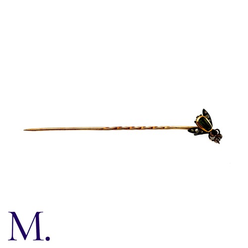 67 - A Gem-Set Insect Stick Pin, in yellow gold and silver, the terminal designed as an insect, the body ... 