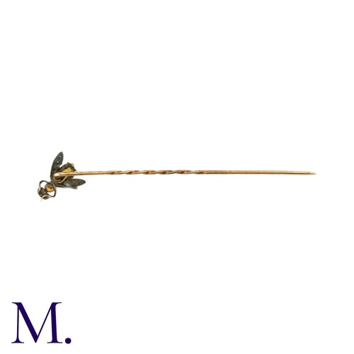 67 - A Gem-Set Insect Stick Pin, in yellow gold and silver, the terminal designed as an insect, the body ... 