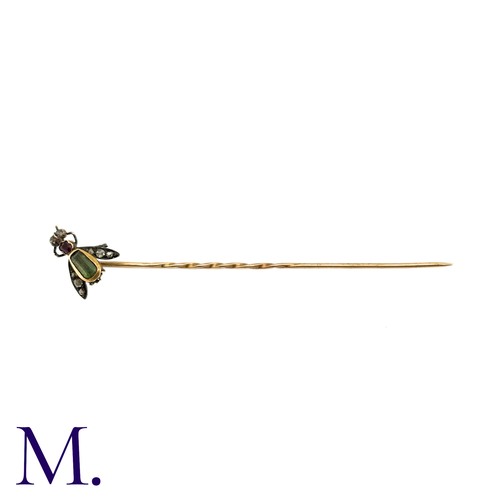 67 - A Gem-Set Insect Stick Pin, in yellow gold and silver, the terminal designed as an insect, the body ... 