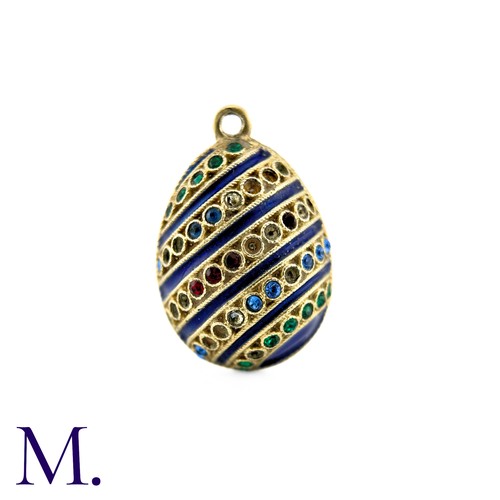 51 - An Enamelled Egg Pendant with blue enamel, set with blue, red and green paste stones. No markings vi... 