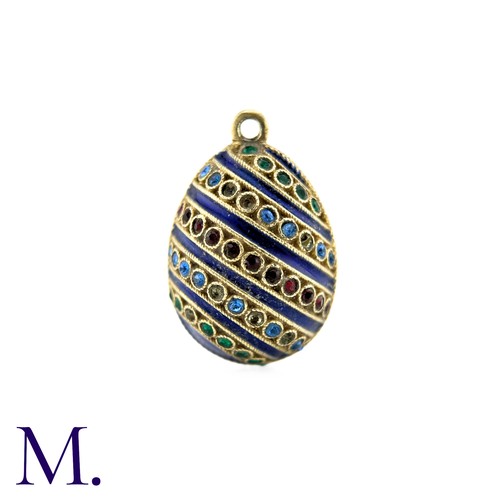 51 - An Enamelled Egg Pendant with blue enamel, set with blue, red and green paste stones. No markings vi... 