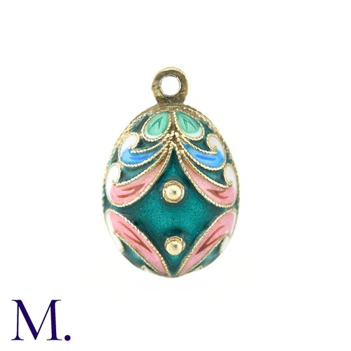 32 - An Enamelled Egg Pendant, with green, pink, blue and white enamel. No marks visible.

Size: 2.1cm
We... 