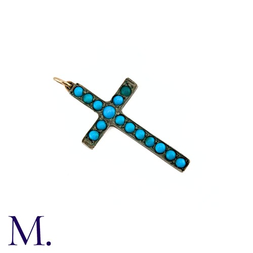 69 - A Turquoise Cross Pendant in silver, set with cabochon turquoise. No markings visible.

Size: 4cm.
W... 