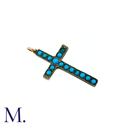 69 - A Turquoise Cross Pendant in silver, set with cabochon turquoise. No markings visible.

Size: 4cm.
W... 