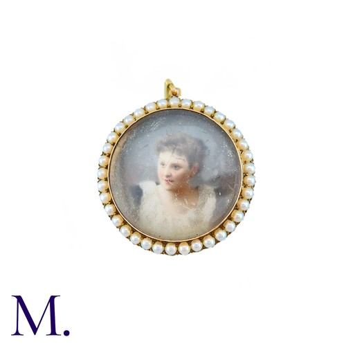 15 - An Antique Portrait Miniature Pendant in yellow gold, set with a miniature depicting a woman, in a b... 