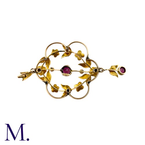 87 - An Antique Garnet And Pearl Pendant in 9k yellow gold, the central round cut garnet set to a bar wit... 