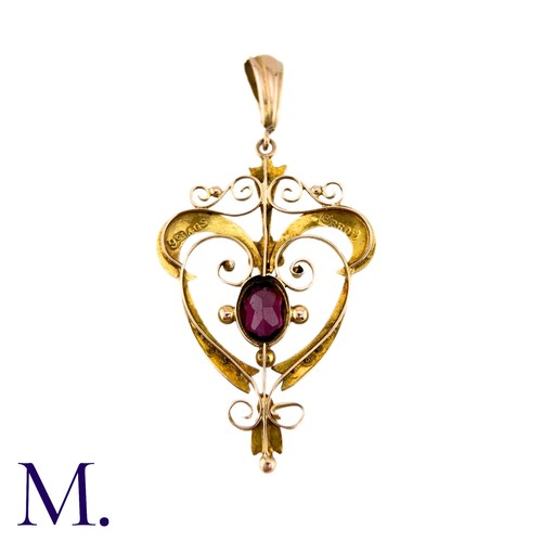 287 - An Antique Garnet and Pearl Pendant in 9k yellow gold, set with a principal oval cut garnet accented... 